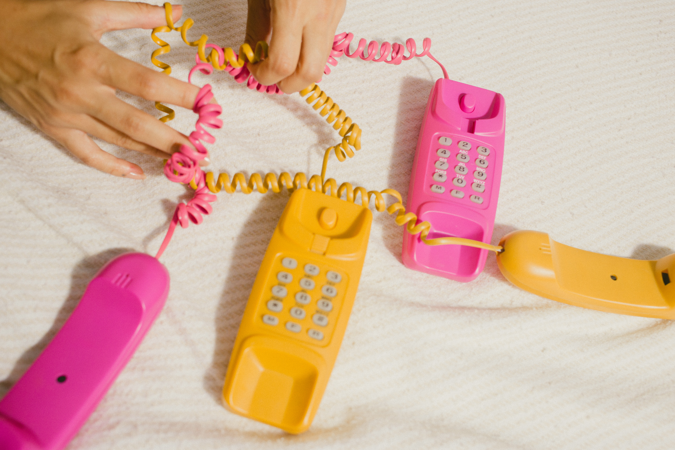 Pink and Yellow Telephones  